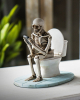 Skeleton On The Toilet Bowl 
